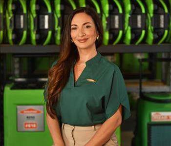 SERVPRO employee in green shirt for crew photo.