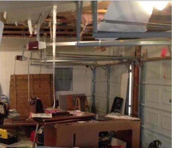 storm damaged garage and ceiling 