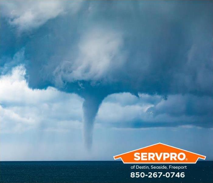 A large waterspout is seen.