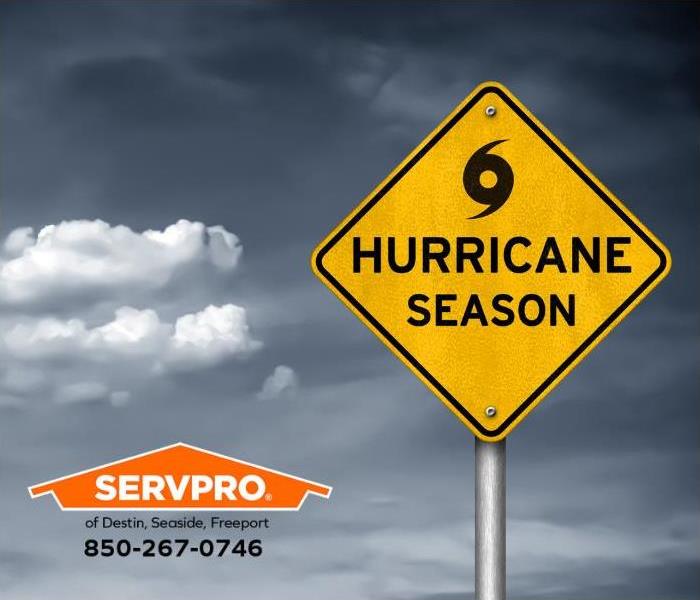 A sign reading “hurricane season” is shown.
